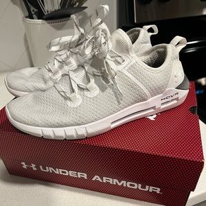White Under Armour tennis shoes